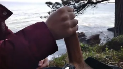 Телка осенним днем дрочит большой член любимого на природе